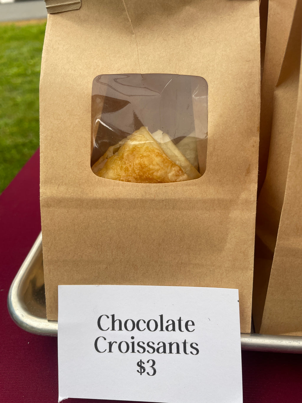 an individual chocolate croissant in a bag